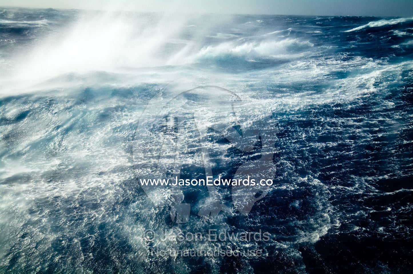 Gale force winds lash huge ocean waves into a violent stretch of water The Drake Passage between the Atlantic Ocean and Pacific Ocean.