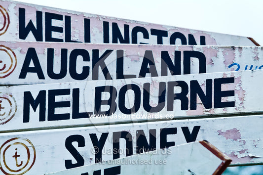 Australian and New Zealand city sign post at a tourist visitor centre. Port of Refuge, Neiafu, Vava'u Island Group, Pacific Ocean, Oceania, Kingdom of Tonga.
