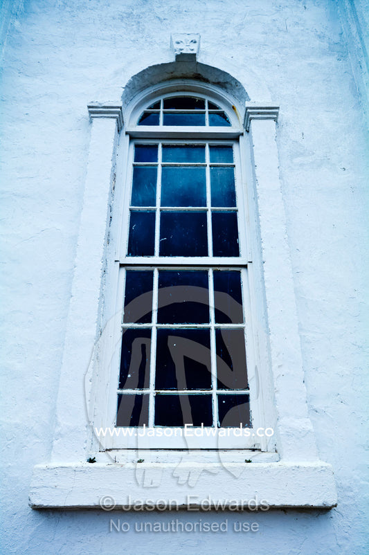 An arched window and panes at St Joseph's Cathedral Catholic Church. Port of Refuge, Neiafu, Vava'u Island Group, Pacific Ocean, Oceania, Kingdom of Tonga.