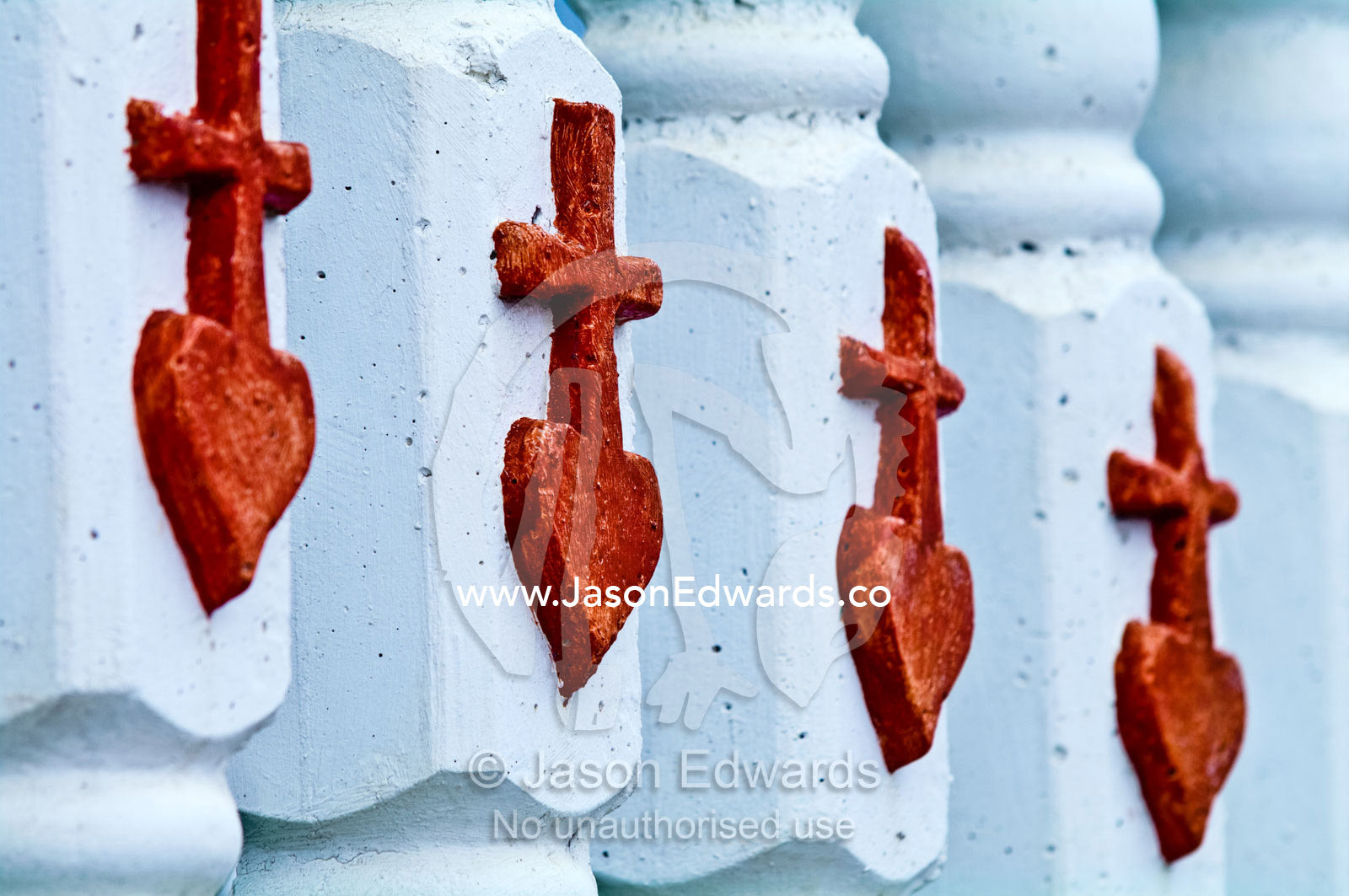 Hearts and crucifix on a fence at St Josephs Cathedral Catholic Church Port of Refuge, Neiafu, Vava'u Island Group, Pacific Ocean, Oceania, Kingdom of Tonga.