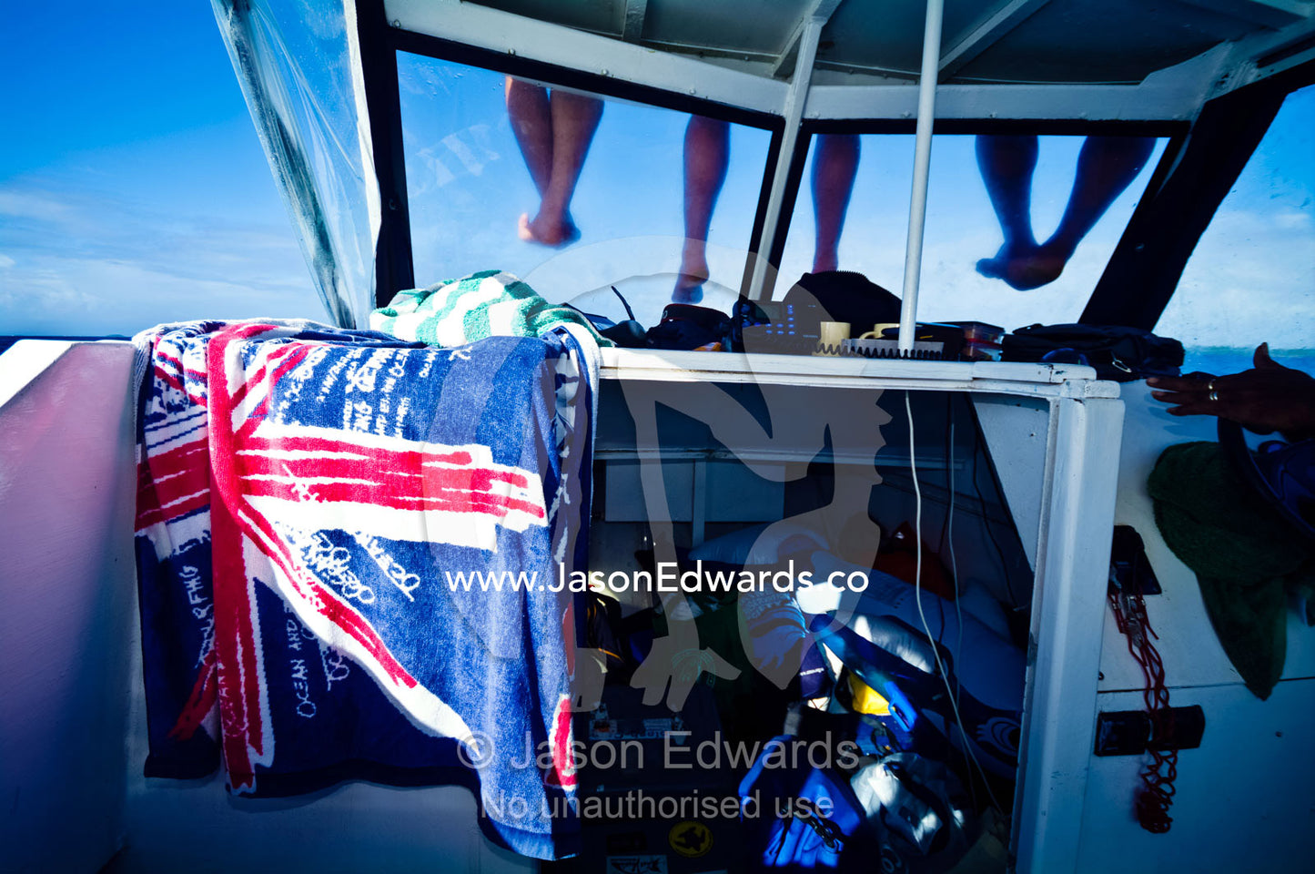 A beach towel featuring the Australian flag on a tourist boat. Vava'u Island Group, Pacific Ocean, Oceania, Kingdom of Tonga.