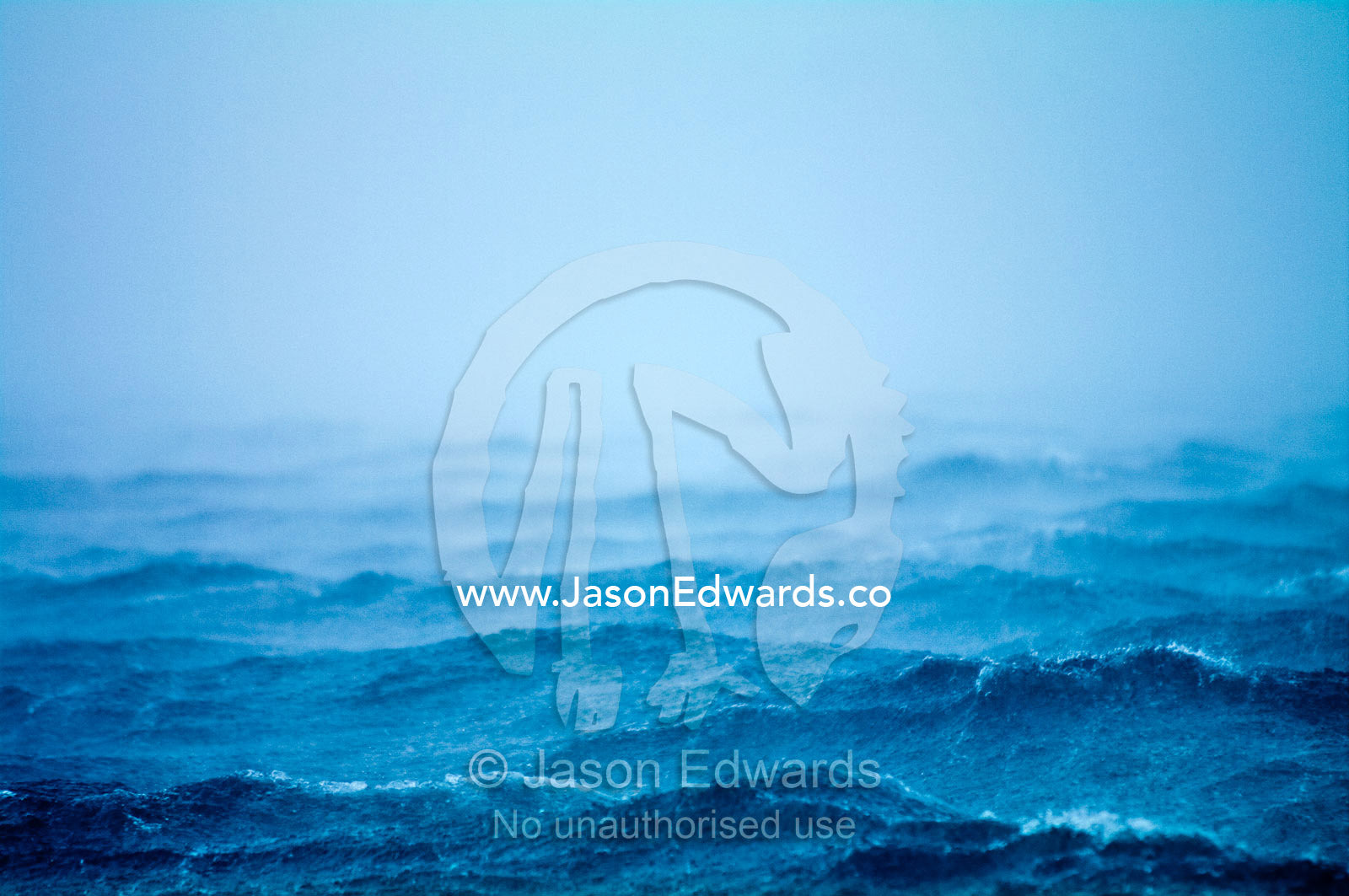 A tropical storm lashes the surface of the ocean with wind and rain. Port of Refuge, Neiafu, Vava'u Island Group, Pacific Ocean, Oceania, Kingdom of Tonga.