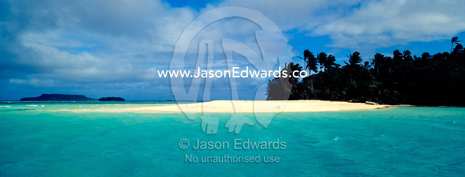 A white sandy beach on an uninhabited remote tropical island. Vava'u Island Group, Pacific Ocean, Oceania, Kingdom of Tonga.