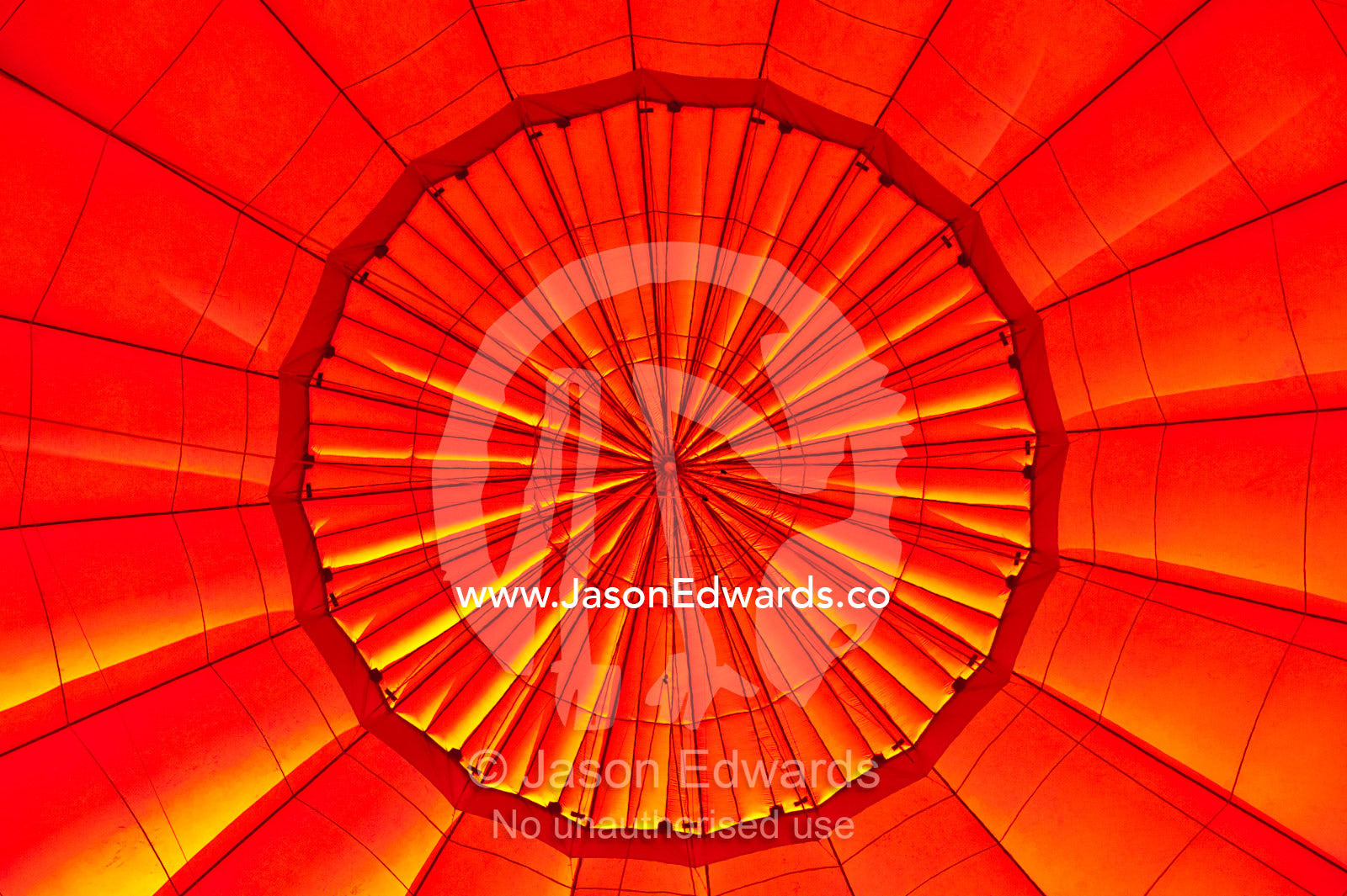 Dawn illuminates the vents of an inflated hot air balloon. Nadi, Pacific Ocean, Fiji Islands.