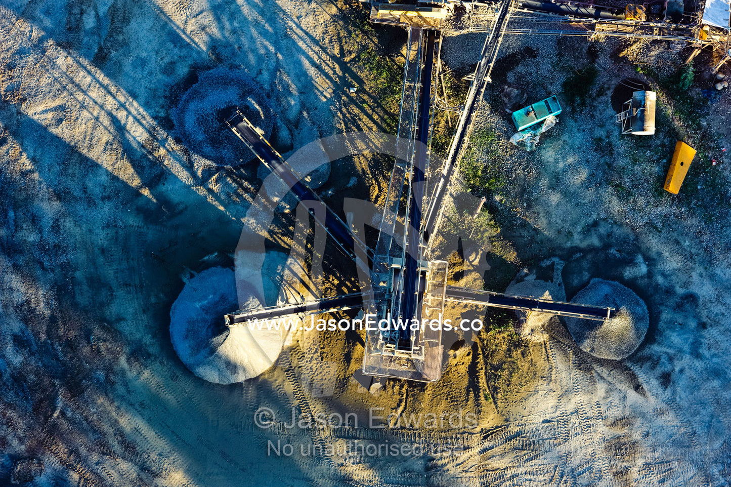 An aerial view of a mine and conveyor belts with piles of cement. Nadi, Pacific Ocean, Fiji Islands.