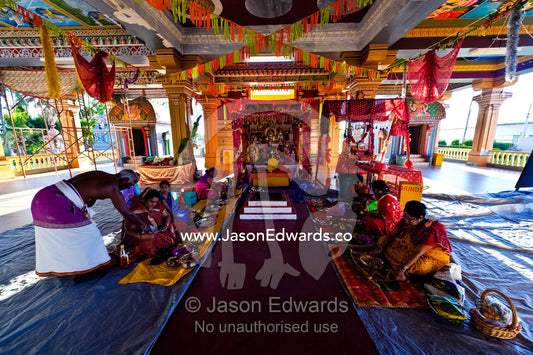 Women prepare intricate meals as prayer offerings in a Hindu temple. Sri Siva Subramaniya Swami Temple, Nadi, Pacific Ocean, Fiji Islands.