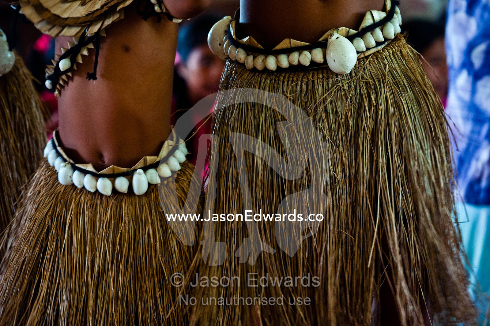 Micronesian children dance in grass skirts and seashell belts. Tabiang Village, Rabi Island, Somosomo Strait, Pacific Ocean, Fiji Islands.