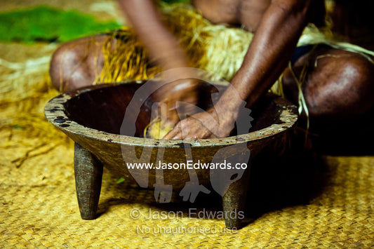Preparing and squeezing kava to drink at a traditional ceremony. Wiwi Village, Taveuni Island, Pacific Ocean, Fiji Islands.
