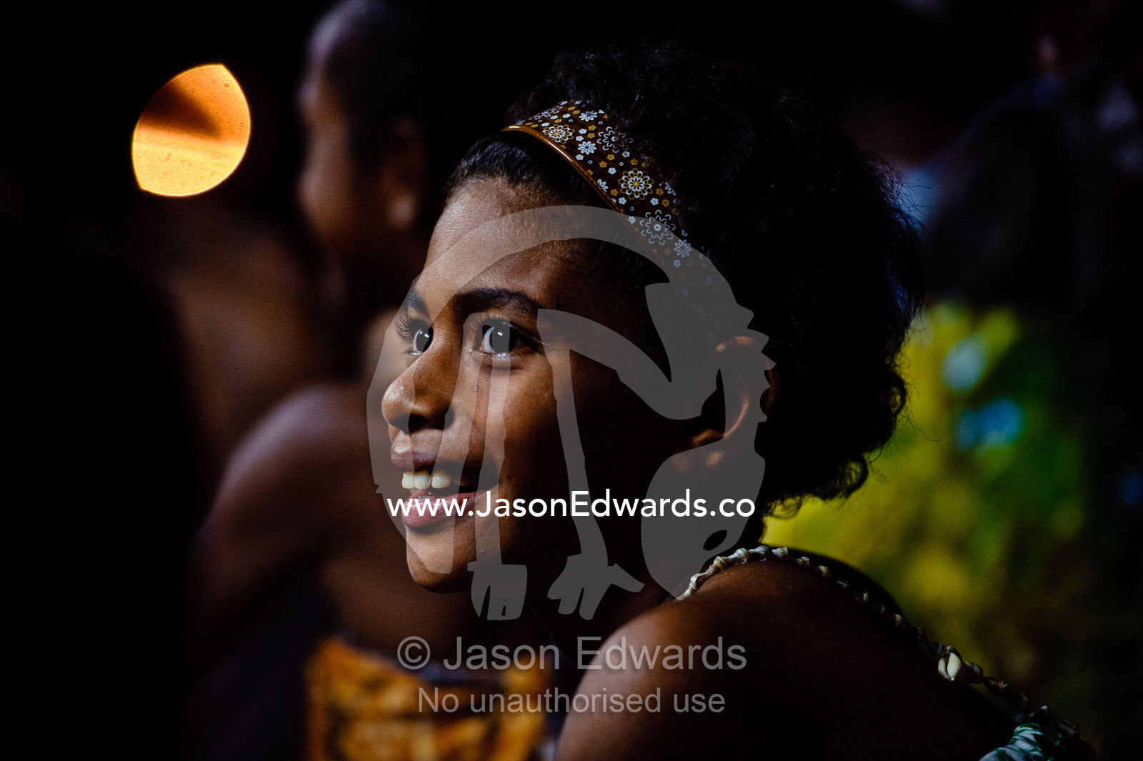 A girl performing a welcome dance at a traditional kava ceremony. Wiwi Village, Taveuni Island, Pacific Ocean, Fiji Islands.