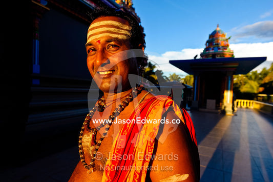 A Hindu priest decorated in makeup and jewellery for a festival. Sri Siva Subramaniya Swami Temple, Nadi, Pacific Ocean, Fiji Islands.