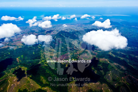 Farmland, timber plantations and deforestation on a tropical island. Viti Levu Island, Pacific Ocean, Fiji Islands.