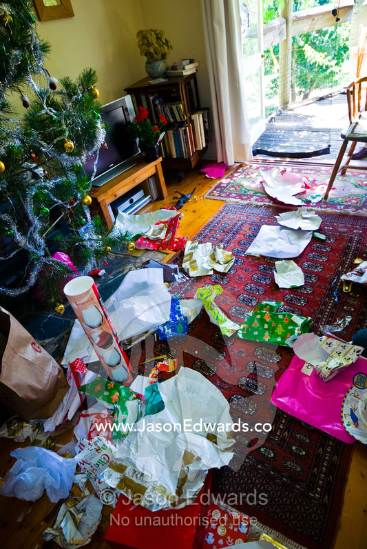 The chaos of wrapping paper removed from gifts on Christmas morning. Castlemaine, Victoria, Australia.