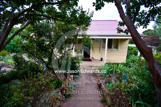 An antique miners cottage and English cottage garden in the country. Castlemaine, Victoria, Australia.