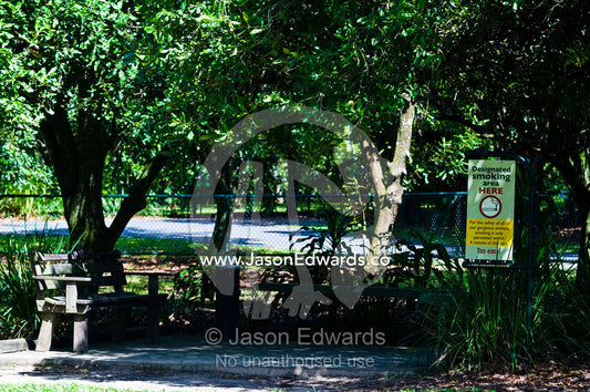 A smoking sign in a zoo garden highlights current public attitude. Australia Zoo, Beerwah, Queensland, Australia.