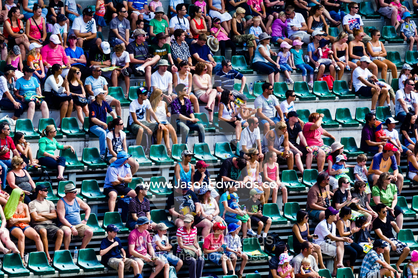 A crowd of tourists watches a wildlife show from a stadium balcony. Crocoseum, Australia Zoo, Beerwah, Queensland, Australia.
