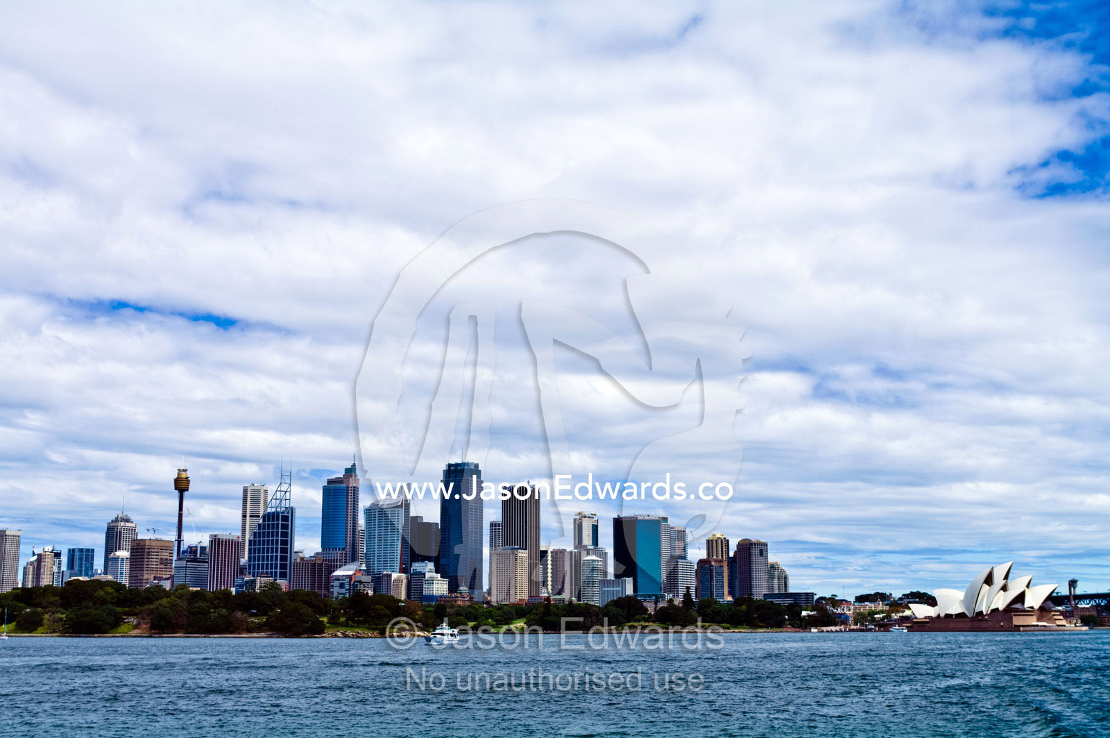 Sydney's central business district skyline and the Sydney Opera House. Bennelong Point, Sydney Harbour, Sydney Cove, Warrane, Port Jackson, Circular Quay, Sydney, New South Wales, Australia.