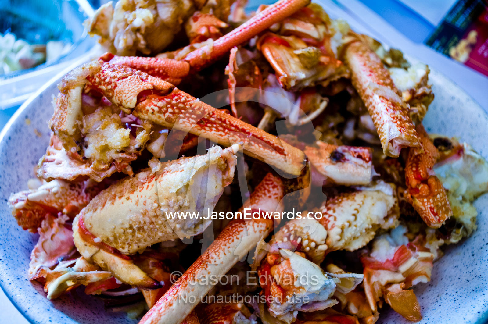 A plate piled high with fresh lobster for a traditional Chinese lunch. Campsie, Syndey, New South Wales, Australia.