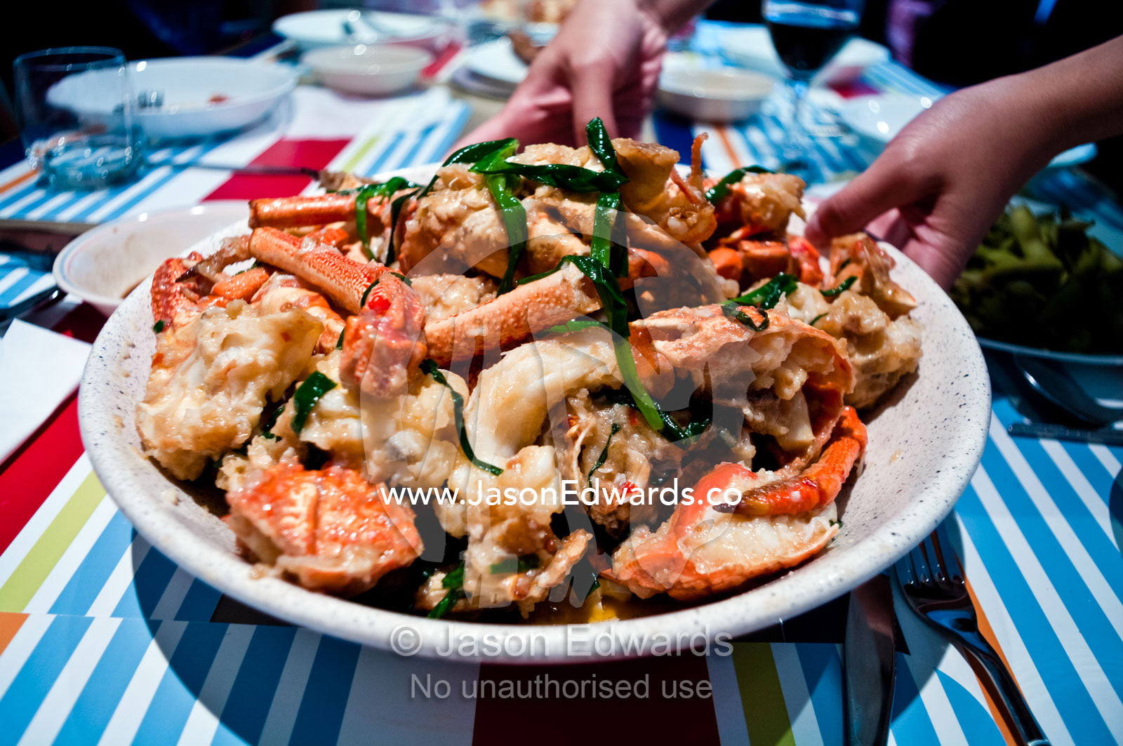 A plate piled high with fresh lobster for a traditional Chinese lunch. Campsie, Syndey, New South Wales, Australia.
