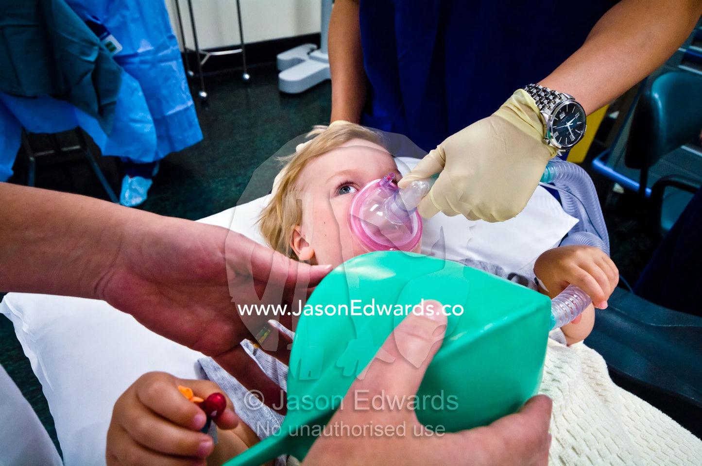 A boy inhales anaesthetic in an operating theatre for ear surgery. Epworth Freemasons Hospital, East Melbourne, Victoria, Australia.