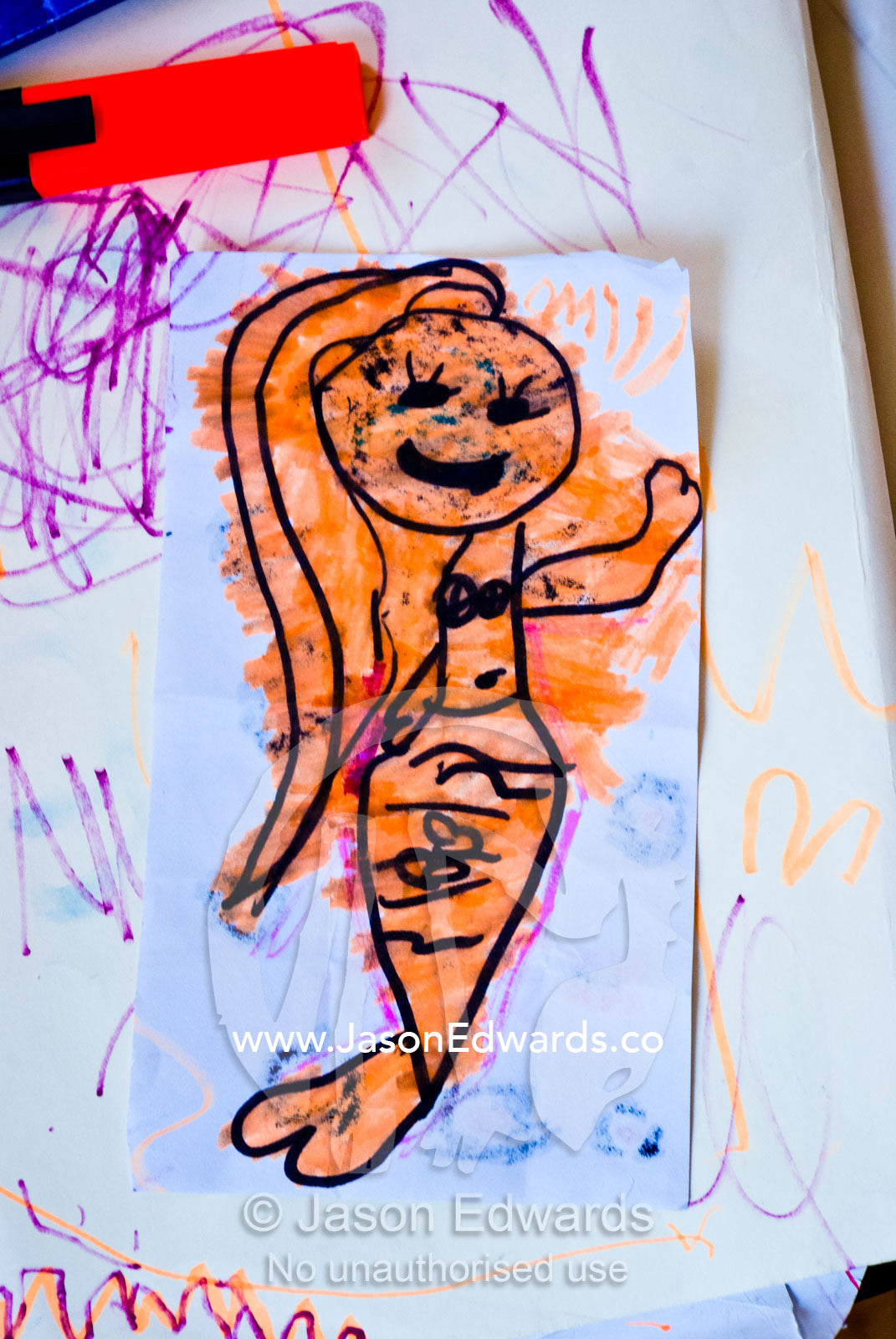 A small child's colouring and drawing of a mermaid. Carlton North, Melbourne, Victoria, Australia.