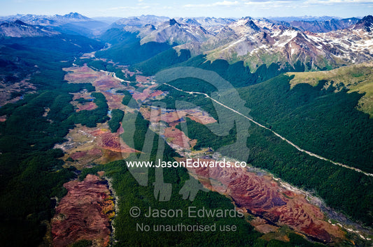 The Pan-American Highway cuts along an Andes valley and beech forest. Martial Mountains, Fuegian Andes, Tierra del Fuego Archipelago, Strait of Magellan, Tierra del Fuego Province, Patagonia, Argentina.