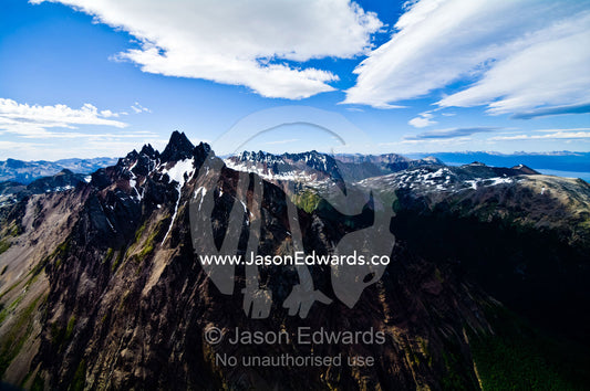Mount Olivia's jagged summit towering over the Andes mountain range. Glacier El Martial, Ushuaia, Fuegian Andes, Tierra del Fuego Archipelago, Straits of Magellan, Tierra del Fuego Province, Patagonia, Argentina.