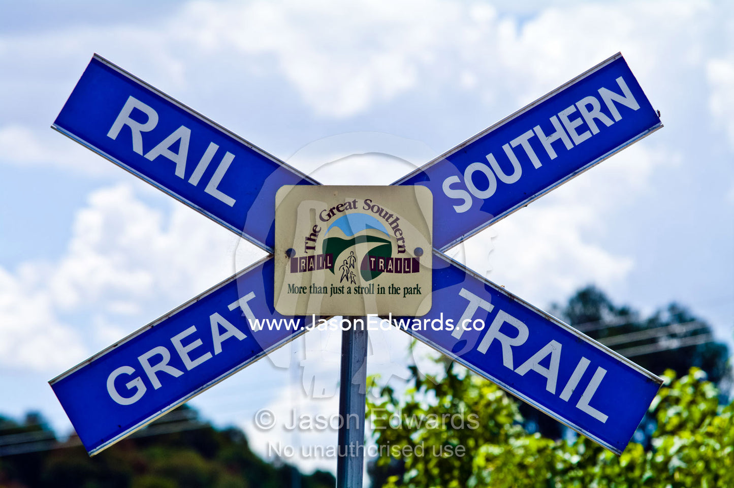 A railway crossing sign for the Great Southern Rail Trail. Fish Creek, South Gippsland, Victoria, Australia.