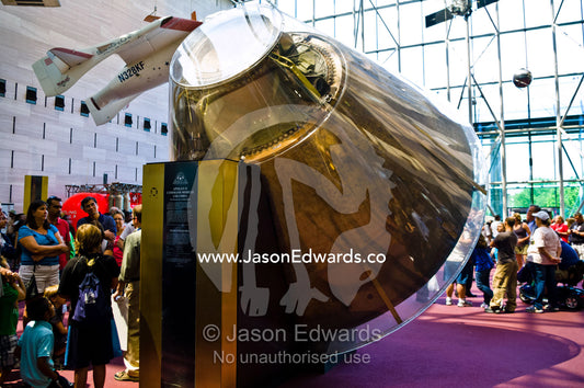 Crowds of tourists view the Apollo 11 Command Module 'Columbia' National Air and Space Museum, Smithsonian Institution, Washington, District of Columbia, United States of America.