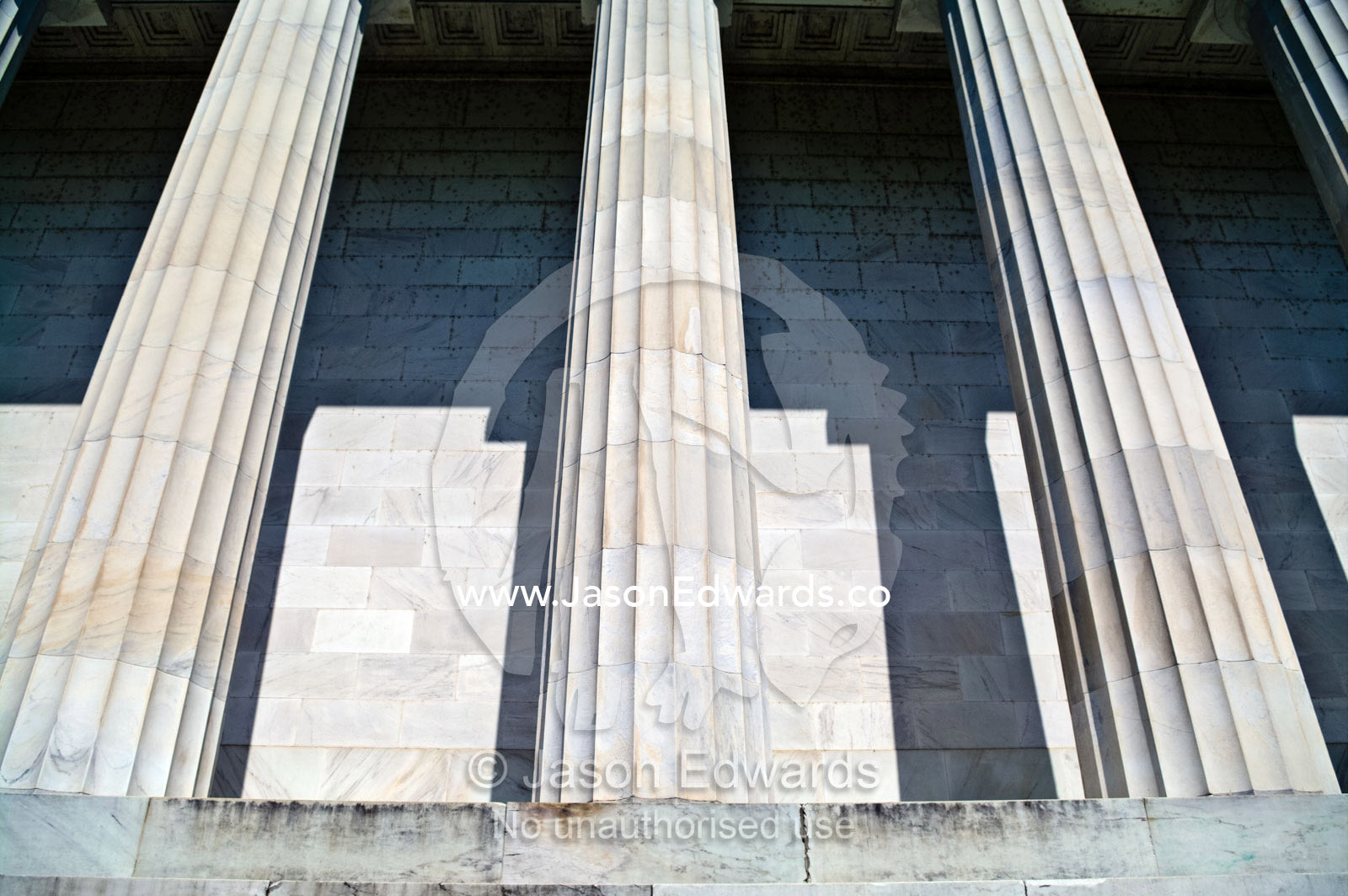 Marble Greek Doric columns support the roof of the Lincoln Memorial. Lincoln Memorial, National Mall, Washington, District of Columbia, United States of America.
