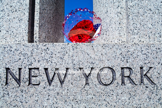 Ceremonial flowers placed on the New York pillar on Memorial Day. National World War II Memorial, National Mall, Washington, District of Columbia, United States of America.