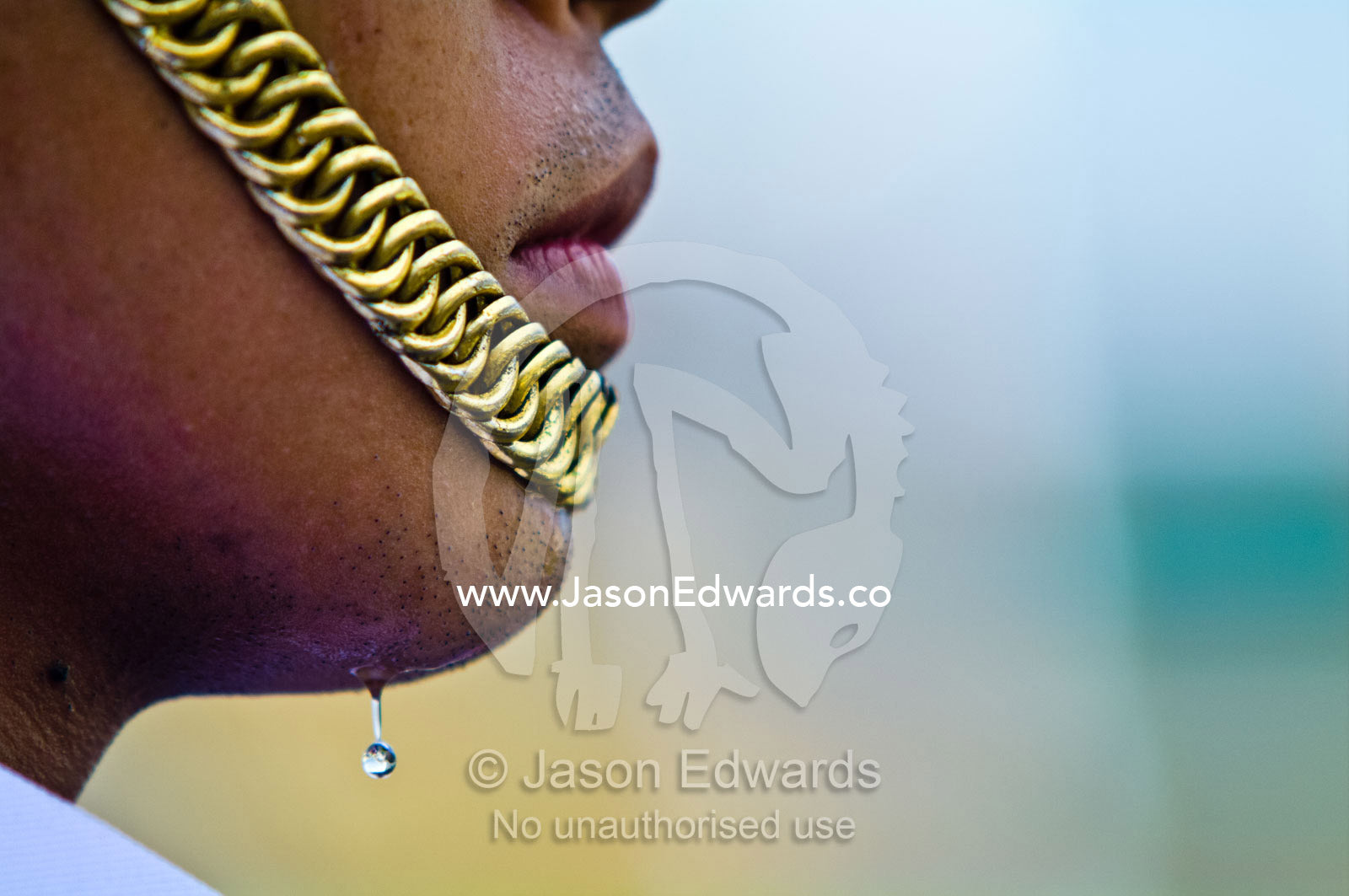 A drop of sweat drips from the chin of a soldier of the Kings Guard. Chakri Maha Prasad, The Grand Palace, The Lord's Supreme Palace, Royal Palace, Bangkok, Thailand.