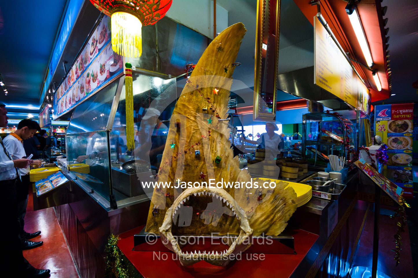 A dried shark fin decorated as a Christmas tree in a mall food court. MBK Centre, Mahboonkrong Shopping Center, Bangkok, Thailand.