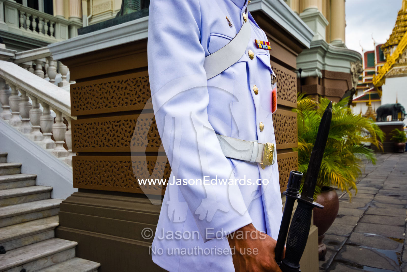 Soldier of the Kings Guard with rifle and bayonet at the Throne Hall. Chakri Maha Prasad, The Grand Palace, The Lord's Supreme Palace, Royal Palace, Bangkok, Thailand.
