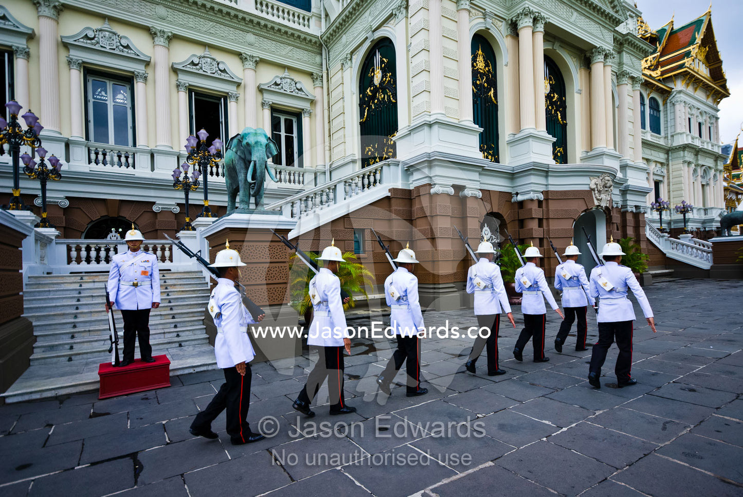 A changing of the Kings Guard in front of the royal Throne Hall. Chakri Maha Prasad, The Grand Palace, The Lord's Supreme Palace, Royal Palace, Bangkok, Thailand.
