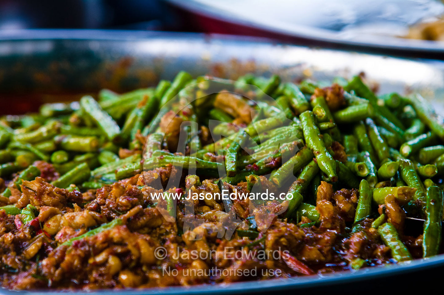 A hot and spicy meal of beans and chilli for sale in a street market. near Wat Pho, Temple of the Reclining Buddha, Wat Chetuphon, Phra Nakhon District, Rattanakosin District, Bangkok, Thailand.
