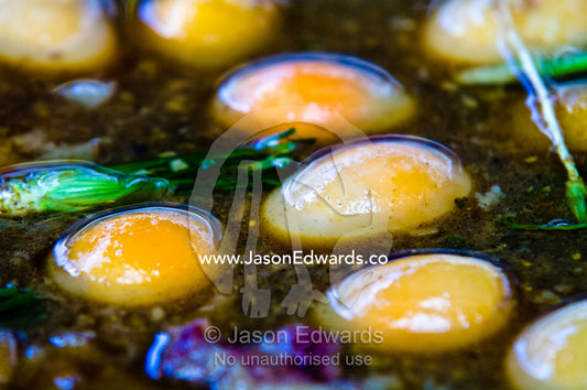 A hot and spicy meal of eggs and chilli for sale in a street market. Wat Pho, Temple of the Reclining Buddha, Wat Chetuphon, Phra Nakhon District, Rattanakosin District, Bangkok, Thailand.