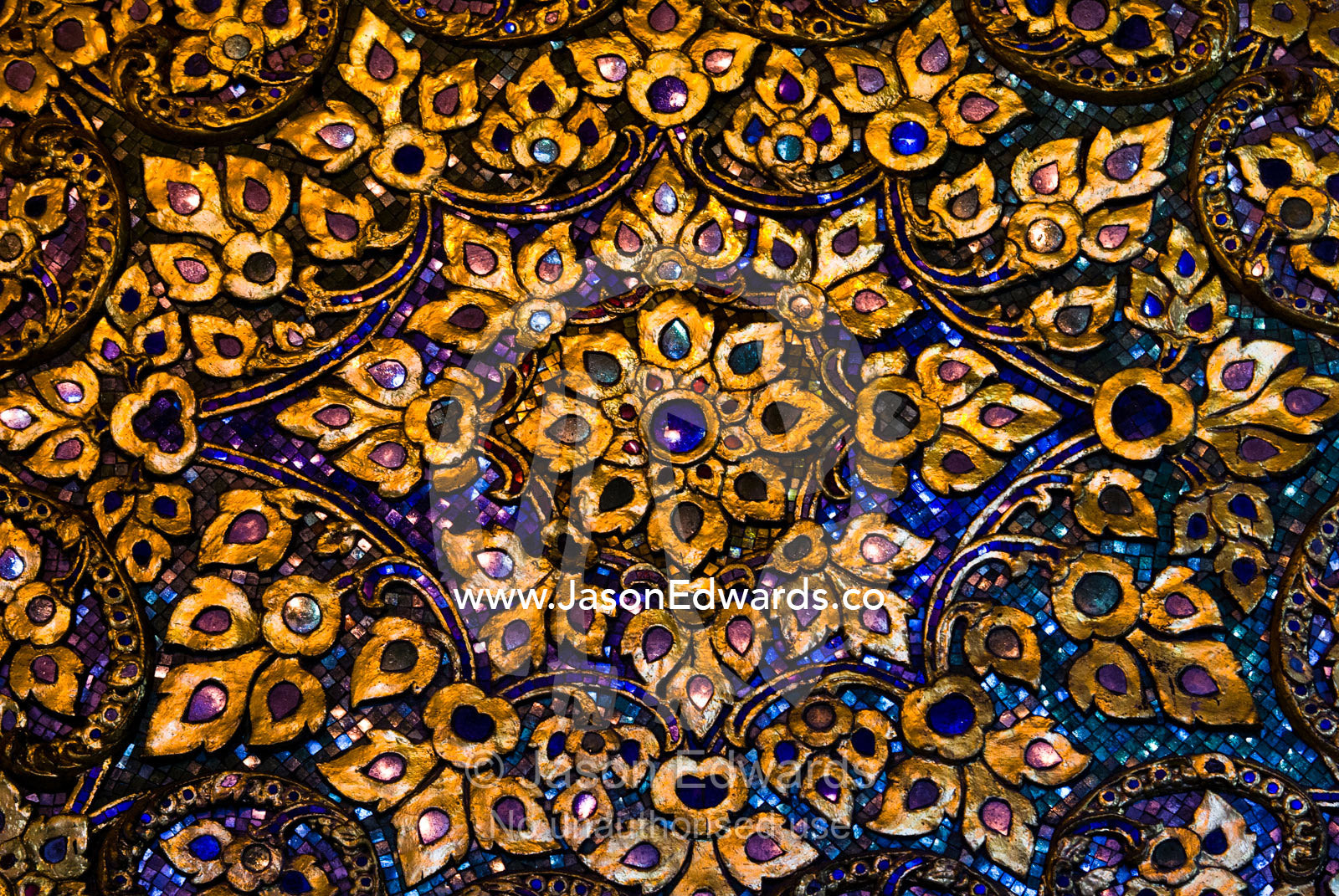 Glass tile mosaic and gold leaves beneath the Reclining Buddha statue. Wat Pho, Temple of the Reclining Buddha, Wat Chetuphon, Phra Nakhon District, Rattanakosin District, Bangkok, Thailand.
