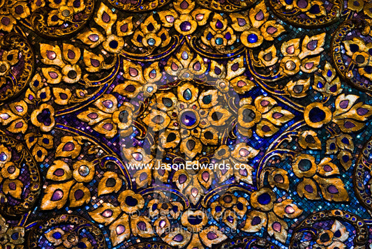 Glass tile mosaic and gold leaves beneath the Reclining Buddha statue. Wat Pho, Temple of the Reclining Buddha, Wat Chetuphon, Phra Nakhon District, Rattanakosin District, Bangkok, Thailand.