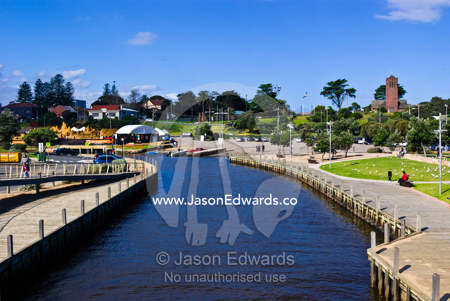 Boardwalks and walking trails through parkland beside a bayside creek. Kananook Creek, Frankston, Port Phillip Bay, Melbourne, Victoria, Australia.