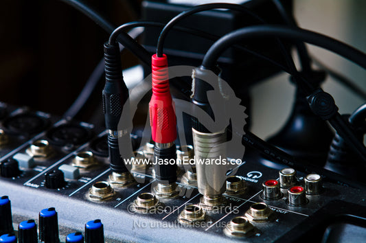 The equalizer knobs and inputs on a portable mixer Park Orchards, Melbourne, Victoria, Australia.