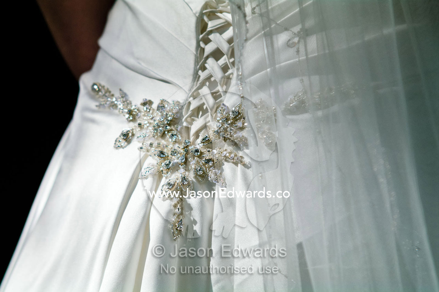 Diamant   appliqu   and corset laces on the back of a satin bridal gown. Park Orchards, Melbourne, Victoria, Australia.