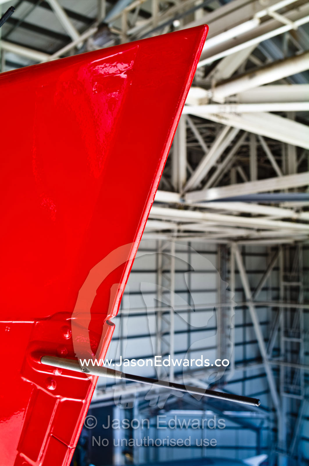 The static discharge wick on the vertical stabilizer of an A380. Kingsford Smith Airport, Mascot, Sydney, New South Wales, Australia.