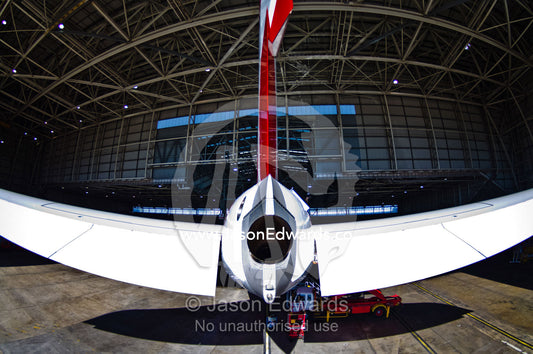 The empennage and auxiliary power unit exhaust of an A380. Kingsford Smith Airport, Mascot, Sydney, New South Wales, Australia.