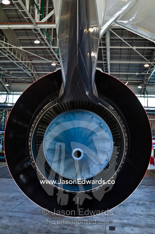 The blue titanium exhaust plug of a Rolls Royce A380 Jet engine. Kingsford Smith Airport, Mascot, Sydney, New South Wales, Australia.