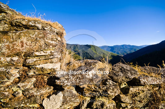 Ancient crumbling handmade steps leading up a Himalayan valley to a Buddhist monastery. Cheri Monastery, Chagri Dorjeden Monastery, Thimphu, Thimphu District, Bhutan.