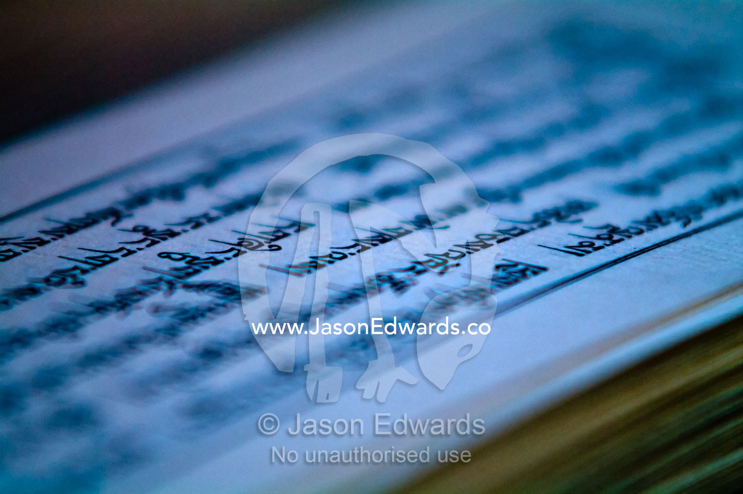 Ancient sanskrit text on the parchment of a Buddhist monk performing a death ceremony. Ganteng, Wangdue Phodrang District, Phobjika Valley, Phobjikha Valley, Gangteng Valley, Black Mountains, Bhutan.