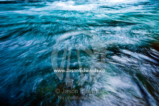 Icy water from snowmelt rushes through a mountain gorge in the Himalaya. Pho Chu, Pho River, Gasa Dzong, Gasa Tashi Tongmon Dzong, Gasa Gasa Dzongkhag District, Bhutan.