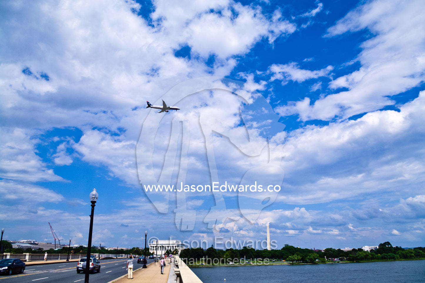 Passenger airliners fly over the Lincoln Memorial and Potomac River. Washington, District of Columbia, United States of America.