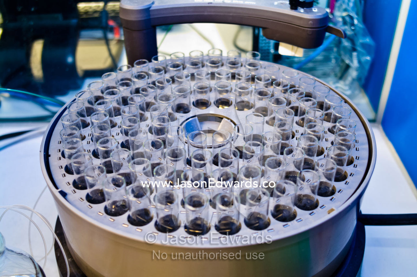 Fraction Collector collects protein samples from liquid chromatography. Bio21 Molecular Science and Biotechnology Institute, University of Melbourne, Parkville, Melbourne, Victoria, Australia.