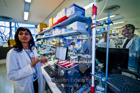 Scientist purify a protein using fast protein liquid chromatography. Bio21 Molecular Science and Biotechnology Institute, University of Melbourne, Parkville, Melbourne, Victoria, Australia.